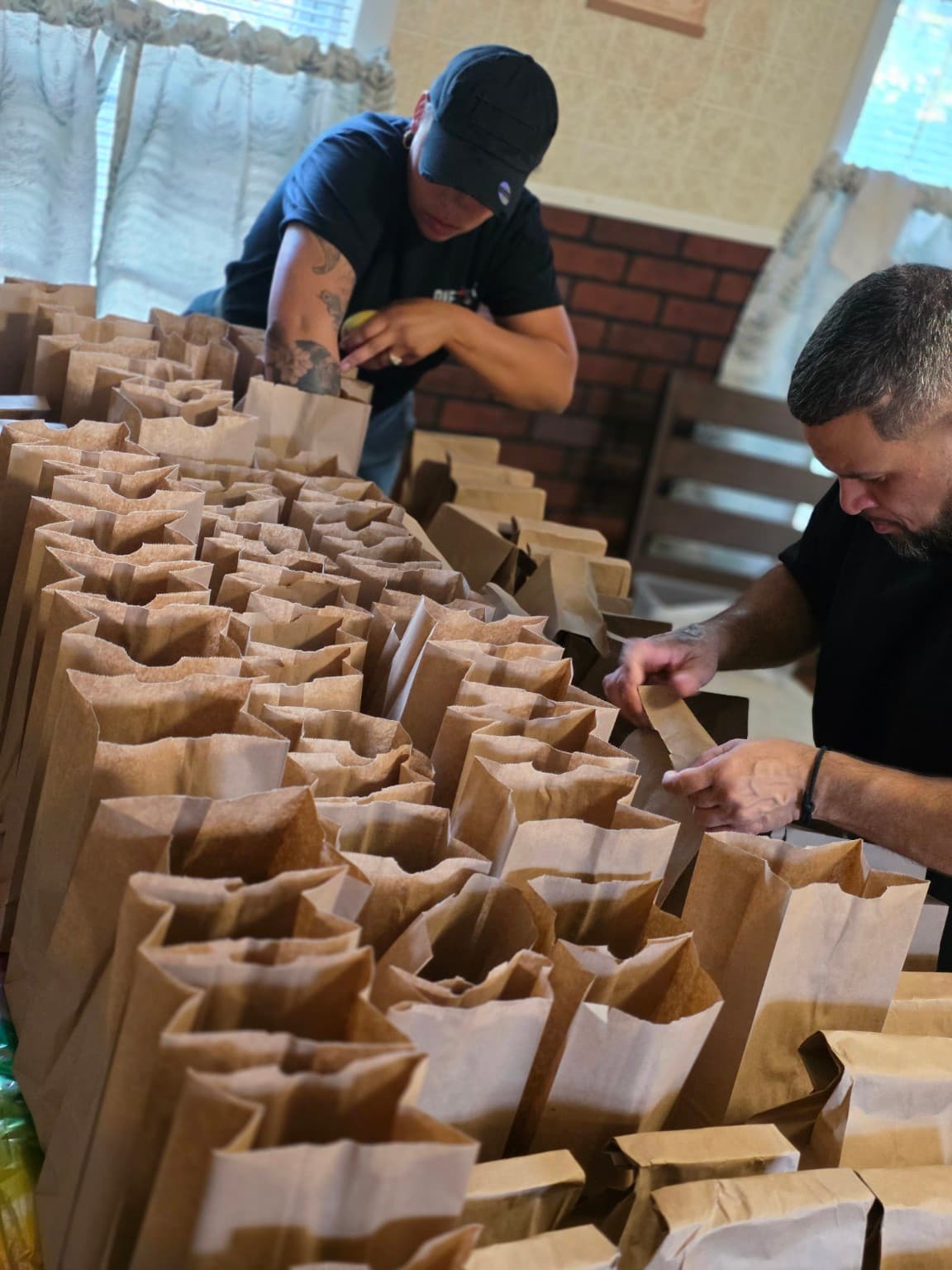 ONE1SIX Church volunteers preparing meals for Worcester neighbors
